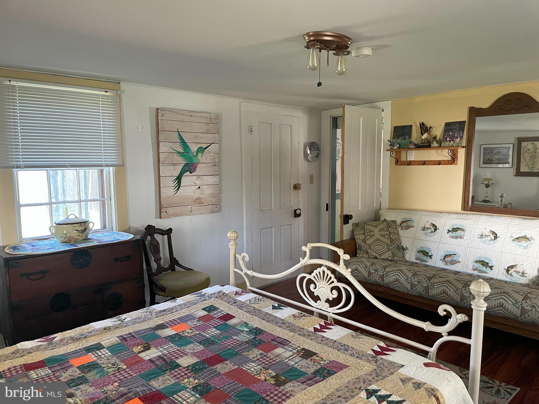 2720 Church Street Quantico, MD 21856 - Photo 14 of 35 a bedroom with a bed and wooden floor