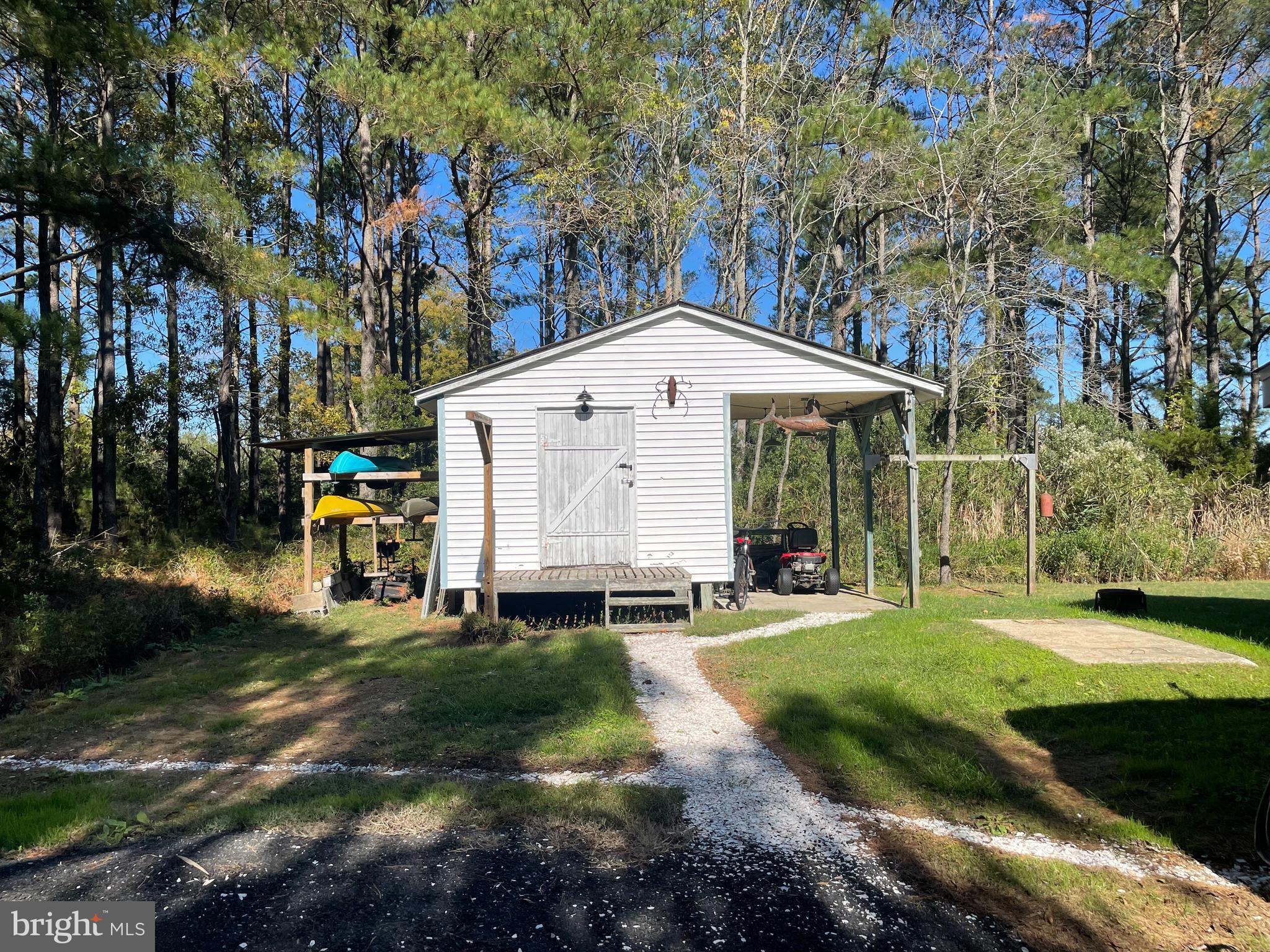 2720 Church Street Quantico, MD 21856 - Photo 31 of 35 a view of a house with backyard sitting area and garden