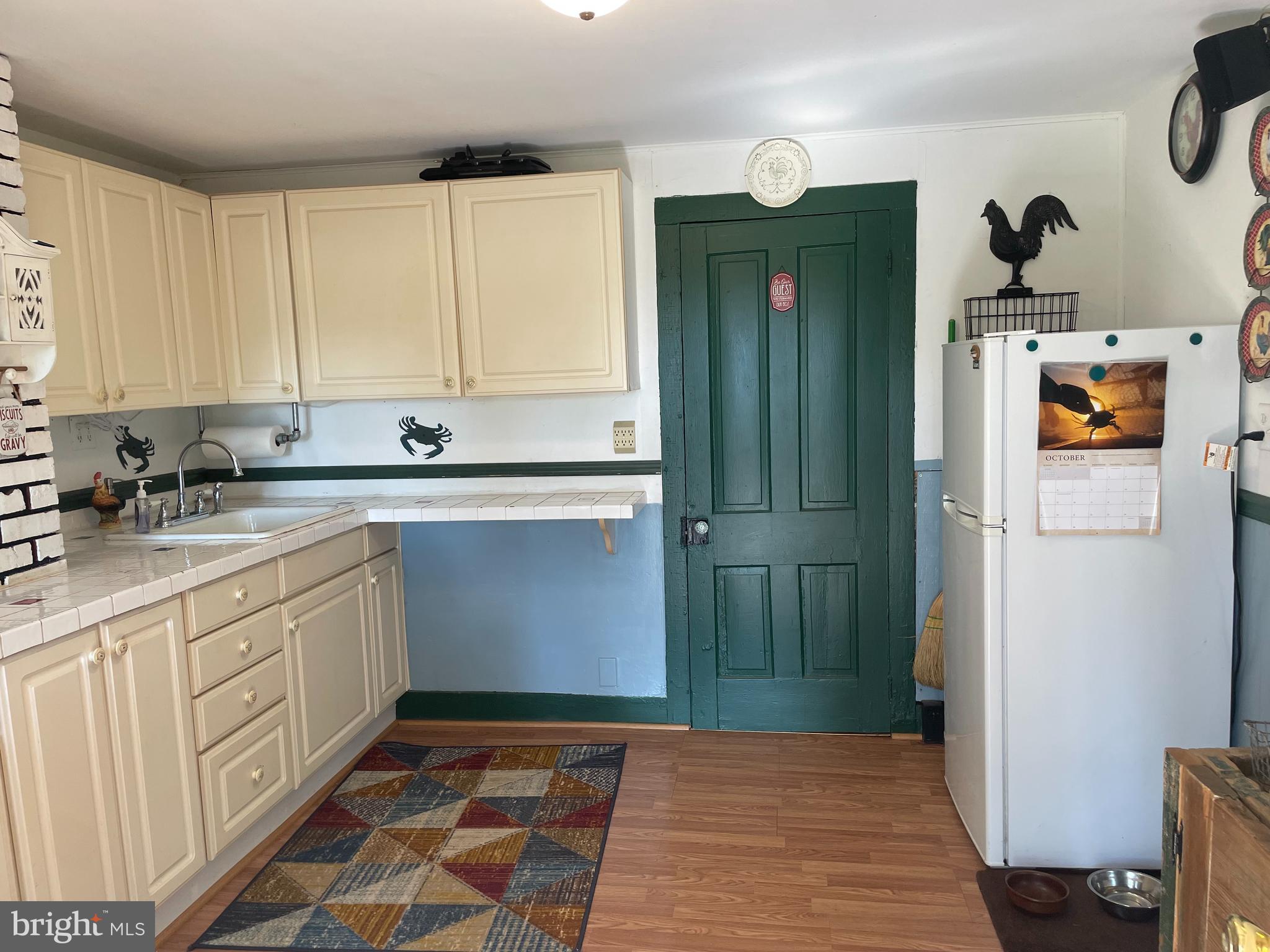 2720 Church Street Quantico, MD 21856 - Photo 6 of 35 a kitchen with stainless steel appliances granite countertop a refrigerator and a sink
