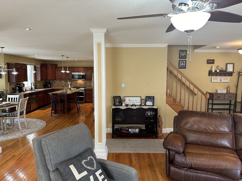329 Forest Hills Road Springfield, MA 01128 - Photo 17 of 42 a living room with furniture and a flat screen tv