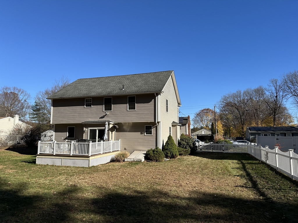 329 Forest Hills Road Springfield, MA 01128 - Photo 6 of 42 a front view of a house with a yard