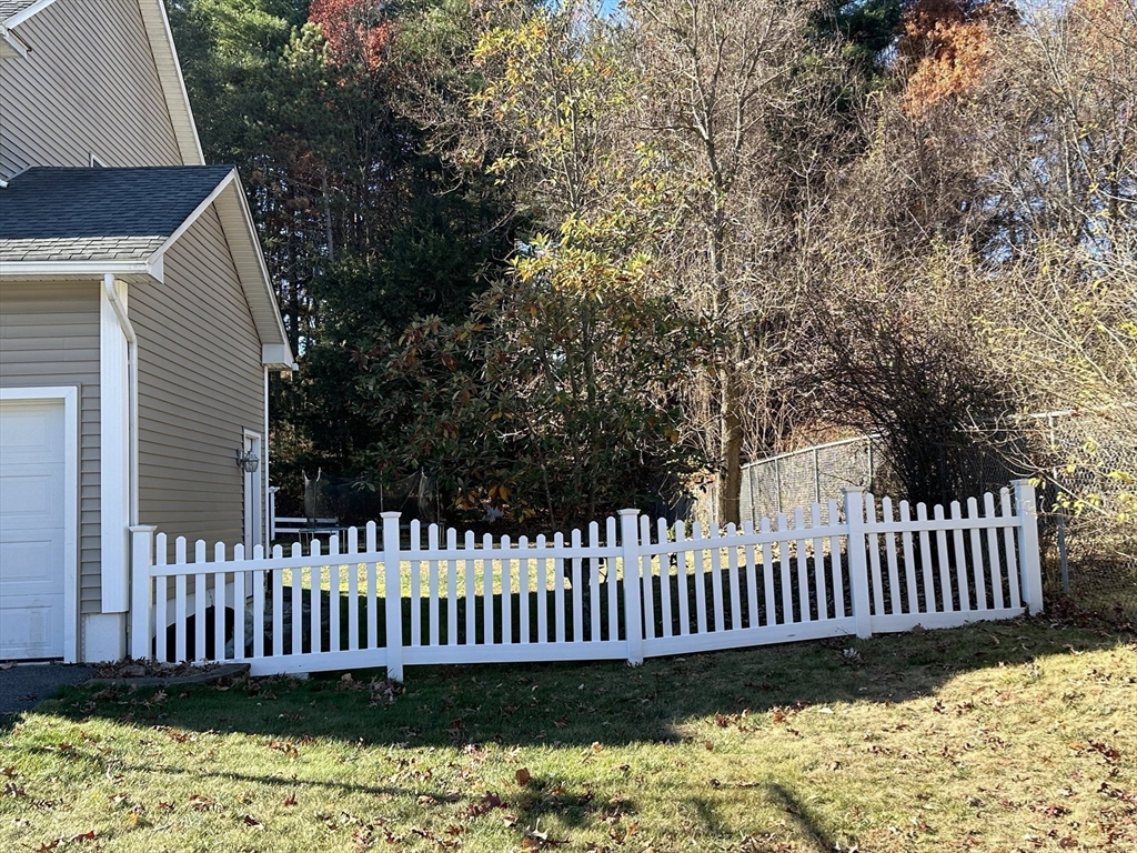 329 Forest Hills Road Springfield, MA 01128 - Photo 8 of 42 a view of a deck with a fence