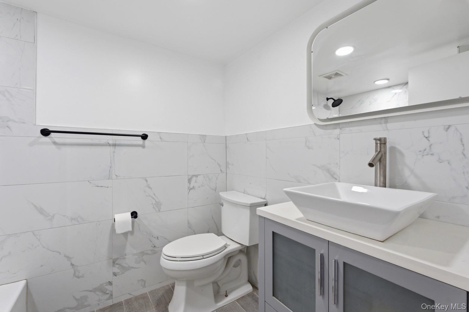 60-89 54th Street Queens, NY 11378 - Photo 21 of 22 Full Bathroom in basement
