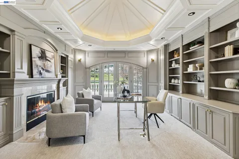 a balcony with furniture and city view