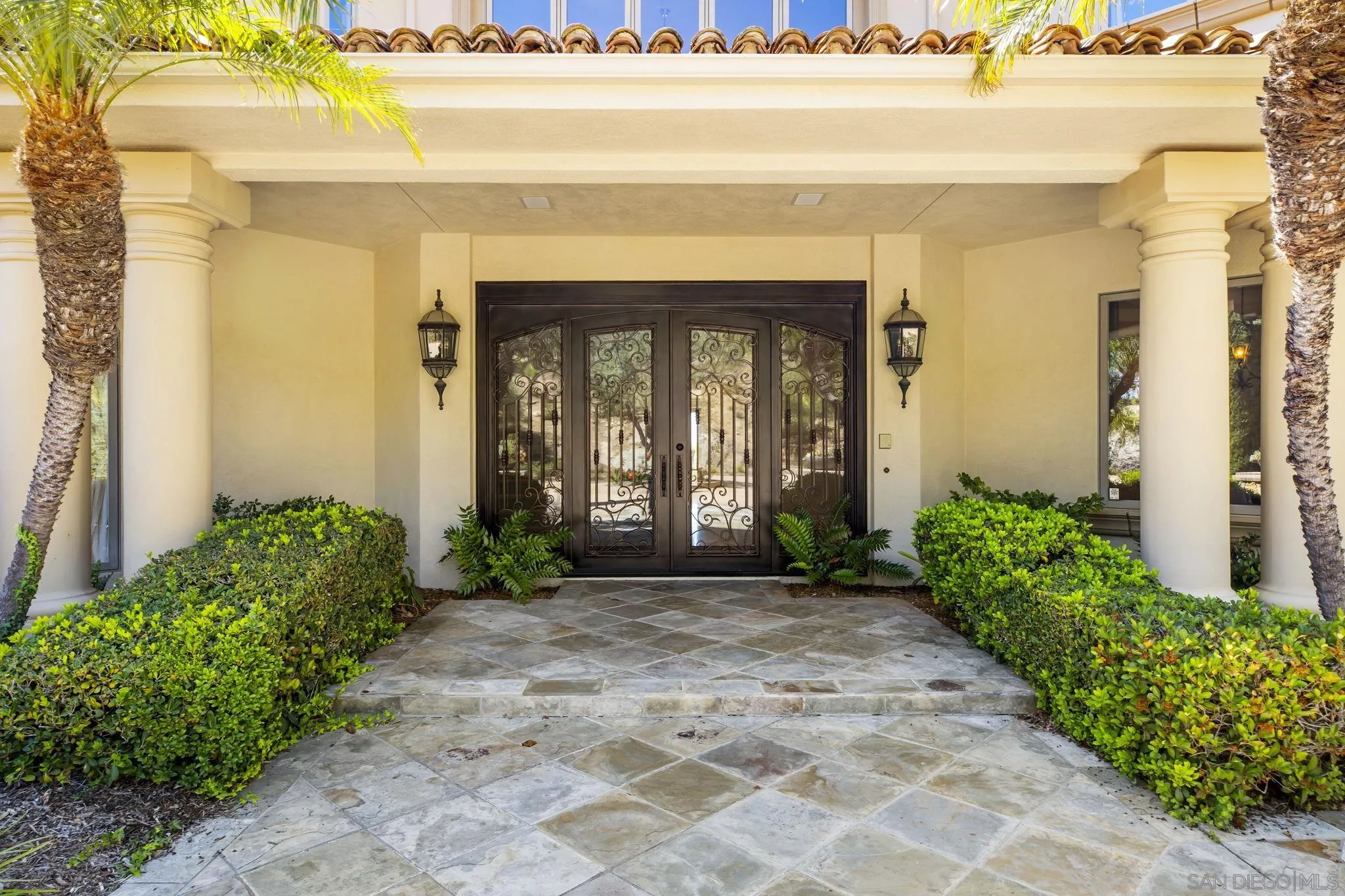 14440 Ridge Ranch Road Valley Center, CA 92082 - Photo 25 of 73 a front view of a house with a porch