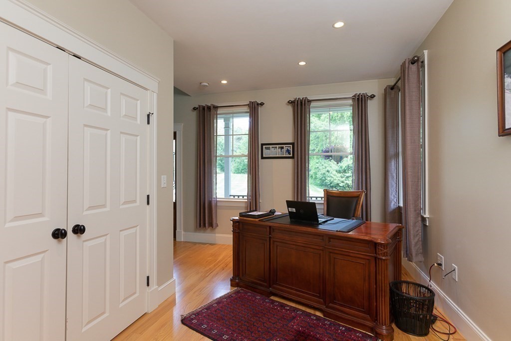 237 Newbury Road Rowley, MA 01969 - Photo 12 of 36 a living room with furniture and a window