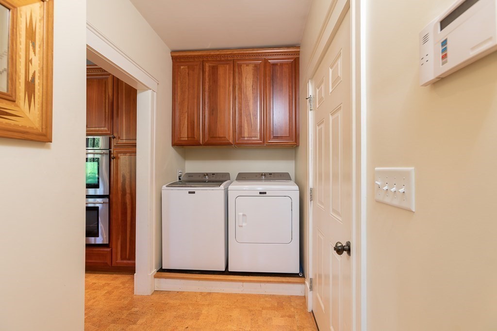 237 Newbury Road Rowley, MA 01969 - Photo 14 of 36 a view of a storage & utility room with a washer dryer