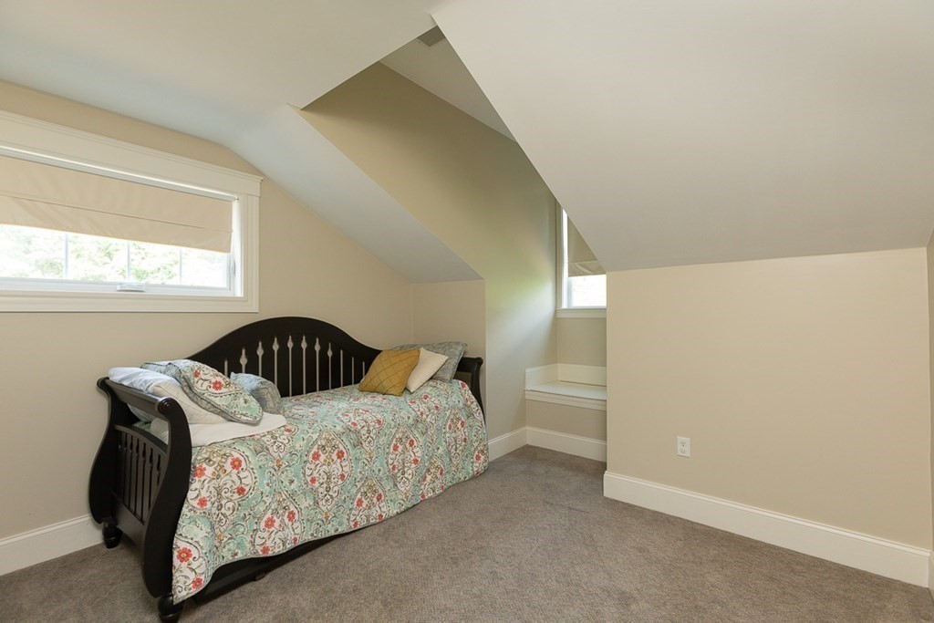237 Newbury Road Rowley, MA 01969 - Photo 23 of 36 a bedroom with a bed and window