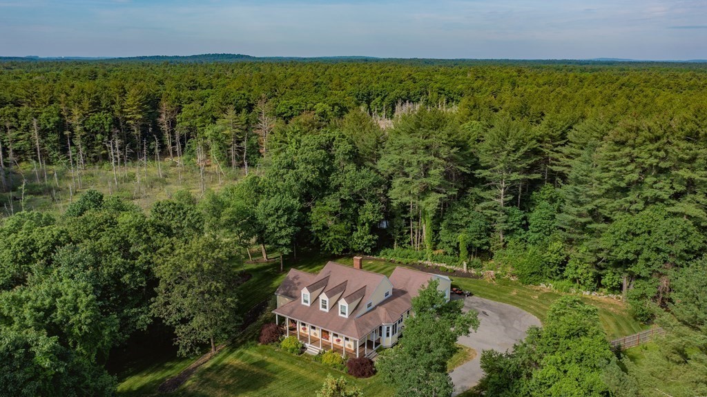 237 Newbury Road Rowley, MA 01969 - Photo 32 of 36 an aerial view of a houses with a yard