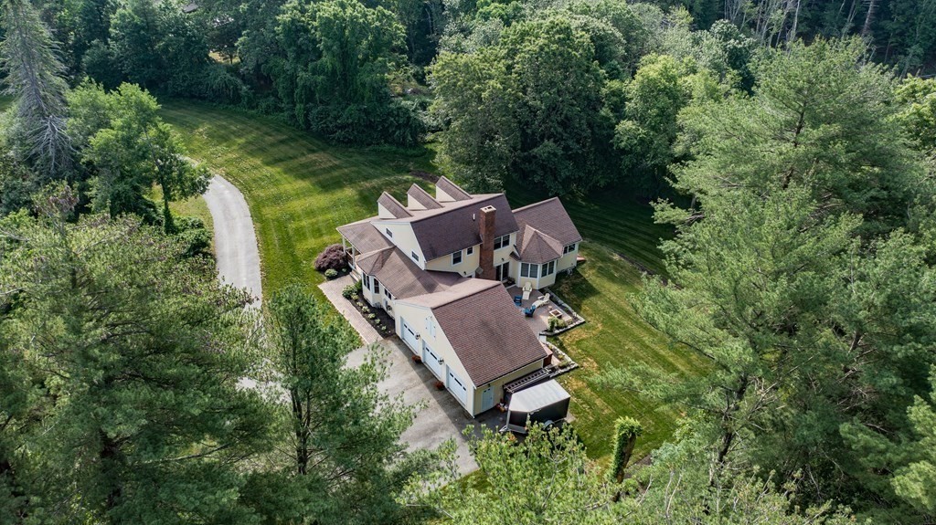 237 Newbury Road Rowley, MA 01969 - Photo 33 of 36 an aerial view of a house with a yard