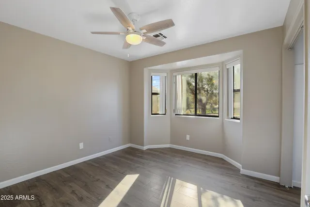 a view of an empty room and window