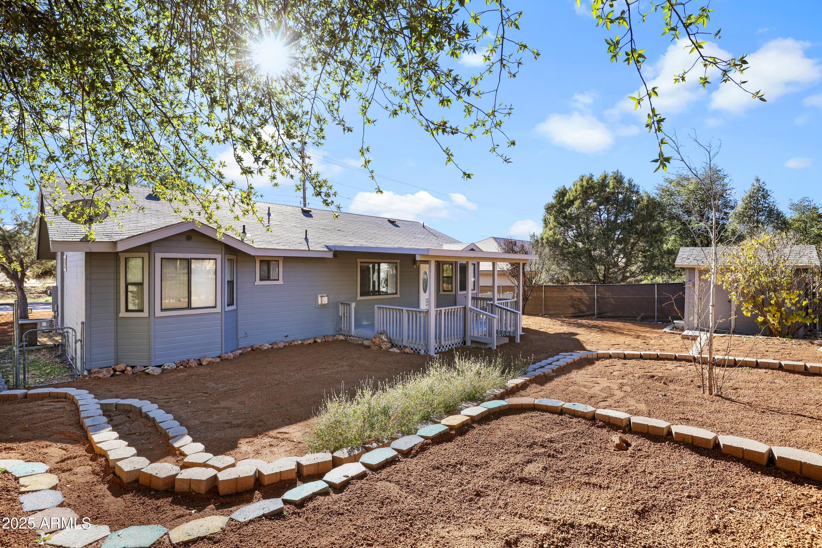 700 West Longhorn Road Payson, AZ 85541 - Photo 20 of 29 a view of a house with a yard