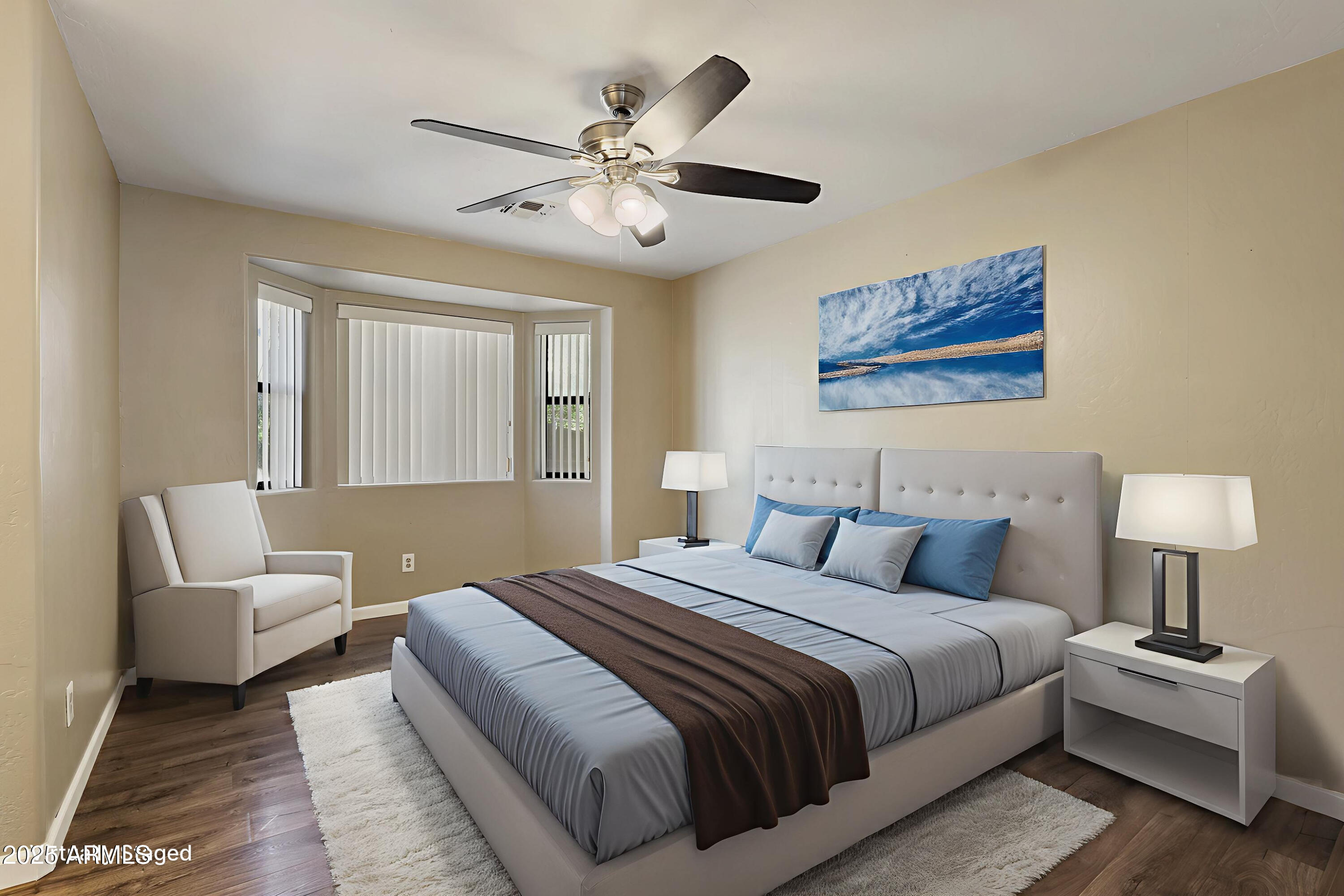 700 West Longhorn Road Payson, AZ 85541 - Photo 10 of 29 a bedroom with a large bed and a couch