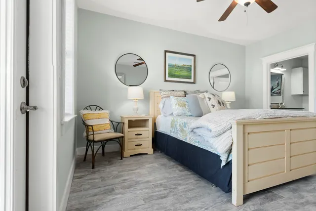 a bedroom with a bed and a dresser