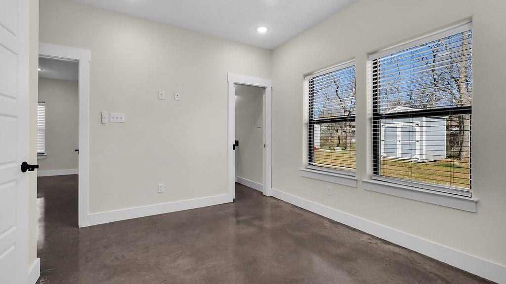 727 East Gandy Street Denison, TX 75021 - Photo 11 of 21 a view of an empty room with a window