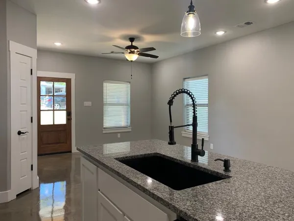 a utility room with washer and dryer