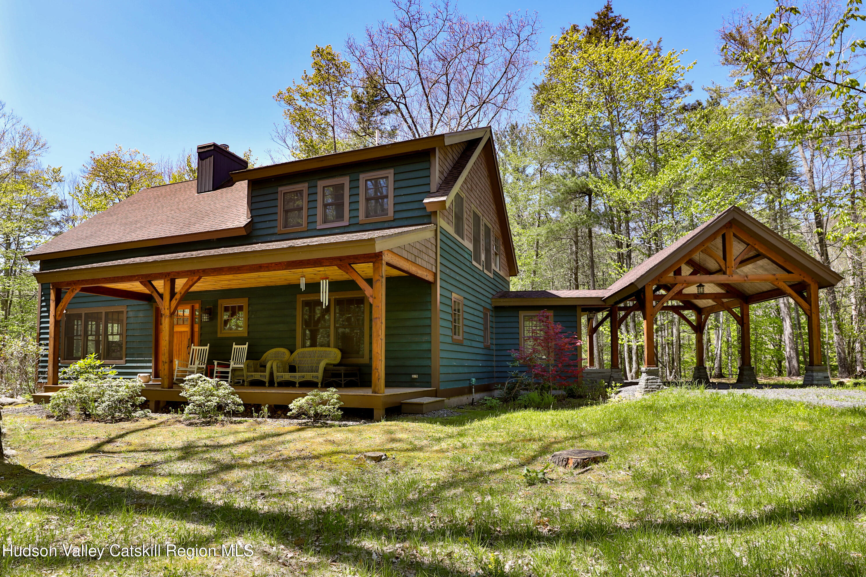 29 Fichtner Road Phoenicia, NY 12464 - Photo 1 of 64 a front view of a house with a yard
