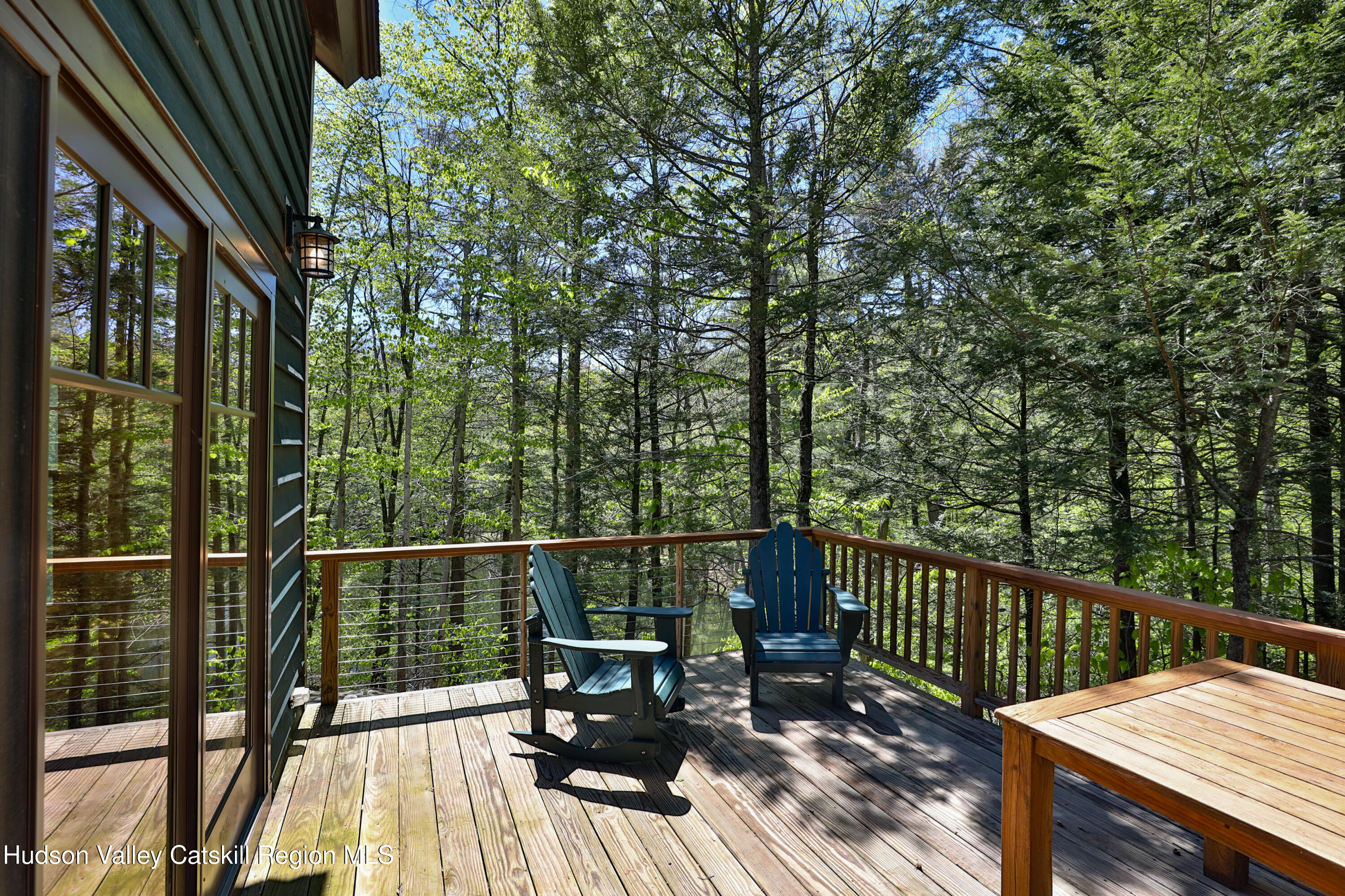 29 Fichtner Road Phoenicia, NY 12464 - Photo 15 of 64 a view of a balcony with wooden floor and outdoor seating