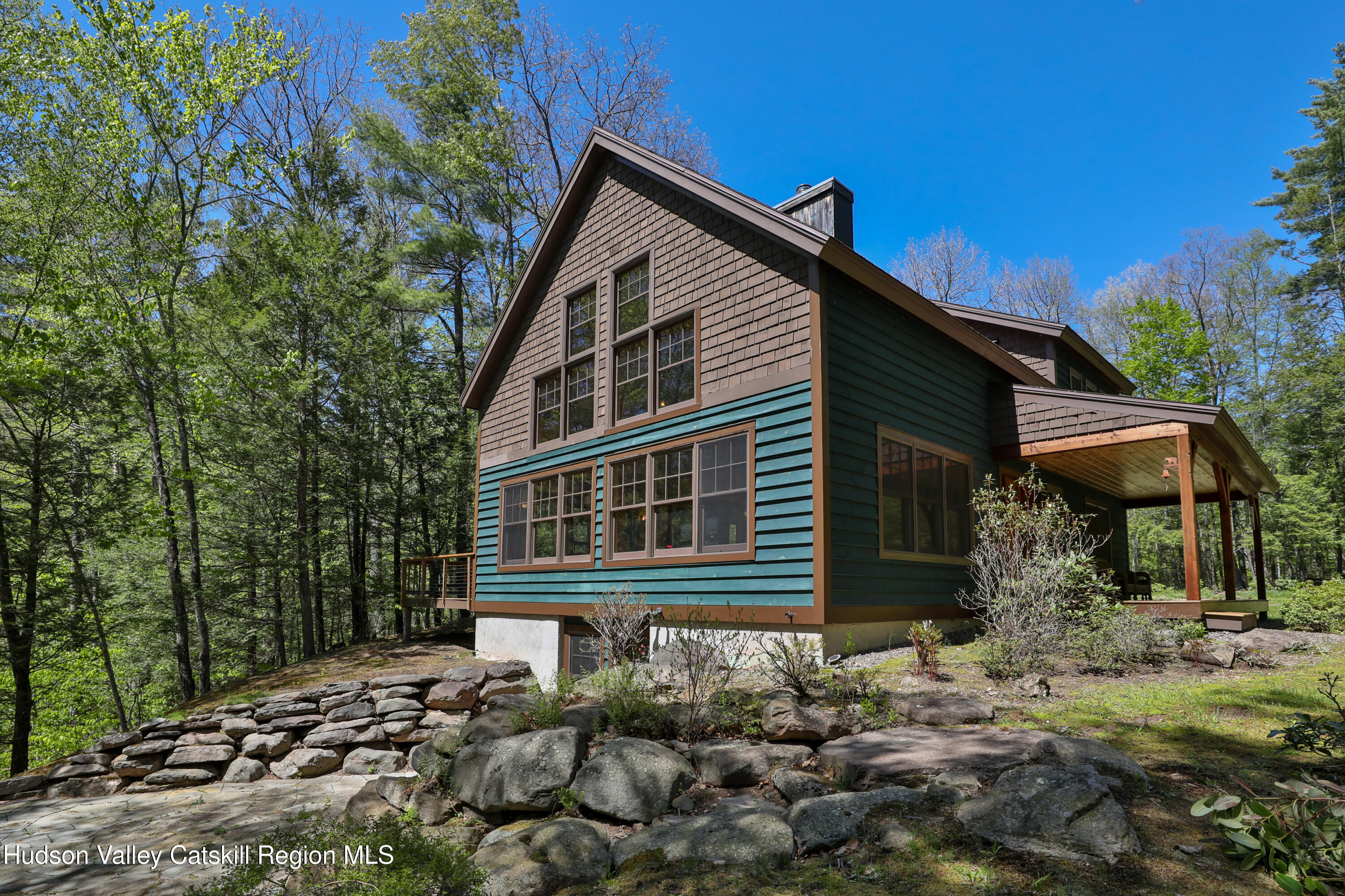 29 Fichtner Road Phoenicia, NY 12464 - Photo 18 of 64 a front view of a house with a yard