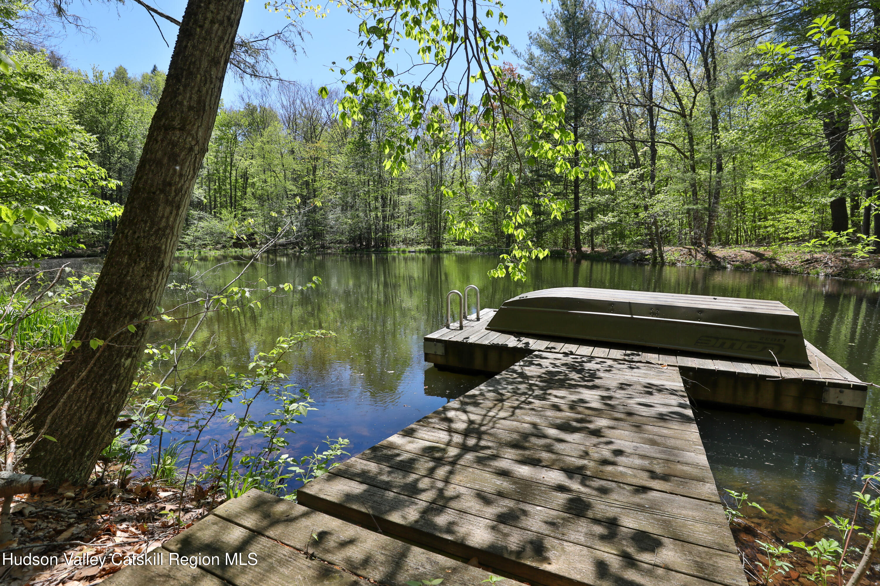 29 Fichtner Road Phoenicia, NY 12464 - Photo 22 of 64 a view of a lake with a patio