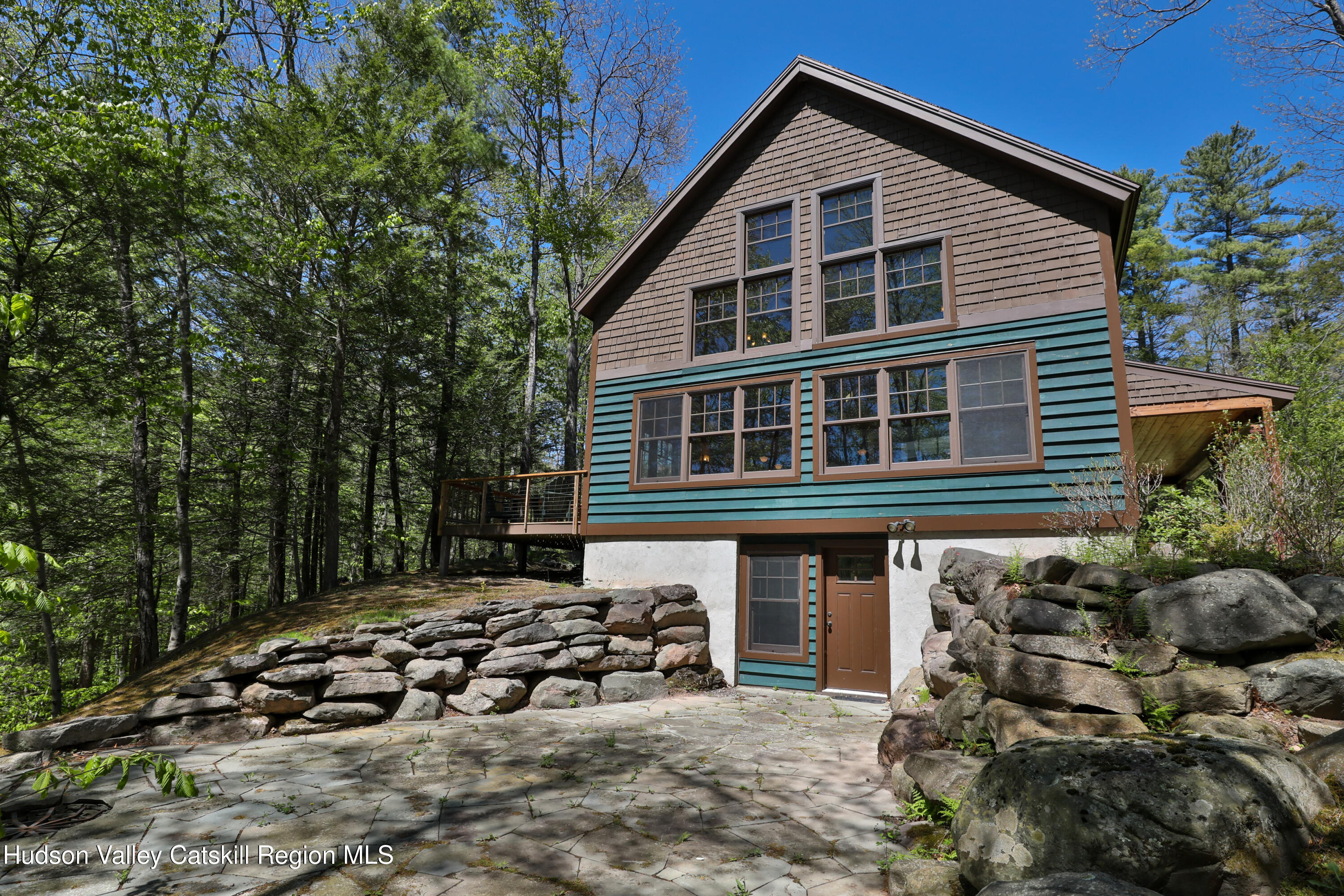 29 Fichtner Road Phoenicia, NY 12464 - Photo 23 of 64 a front view of a house with a yard