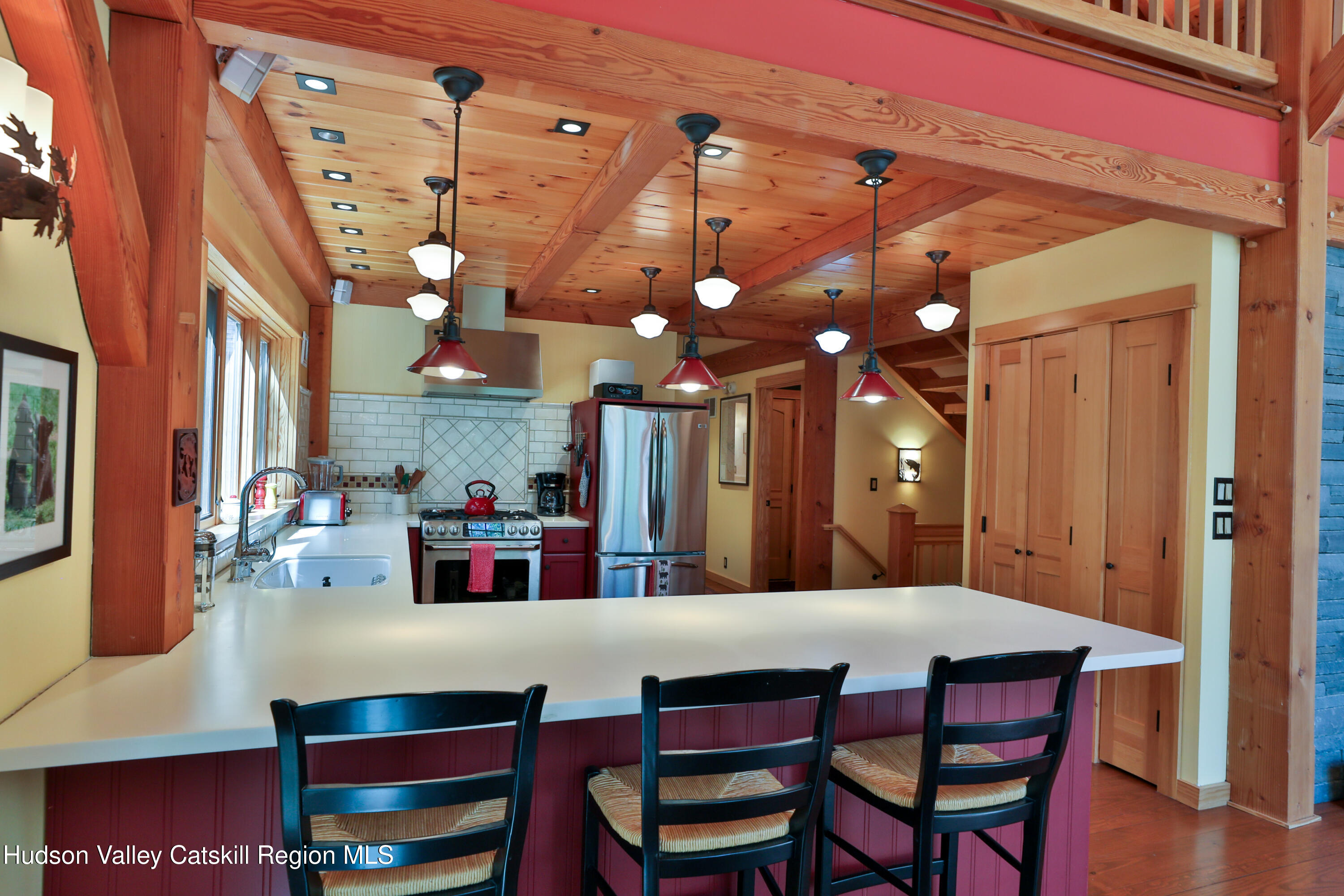 29 Fichtner Road Phoenicia, NY 12464 - Photo 28 of 64 a kitchen with a table and chairs
