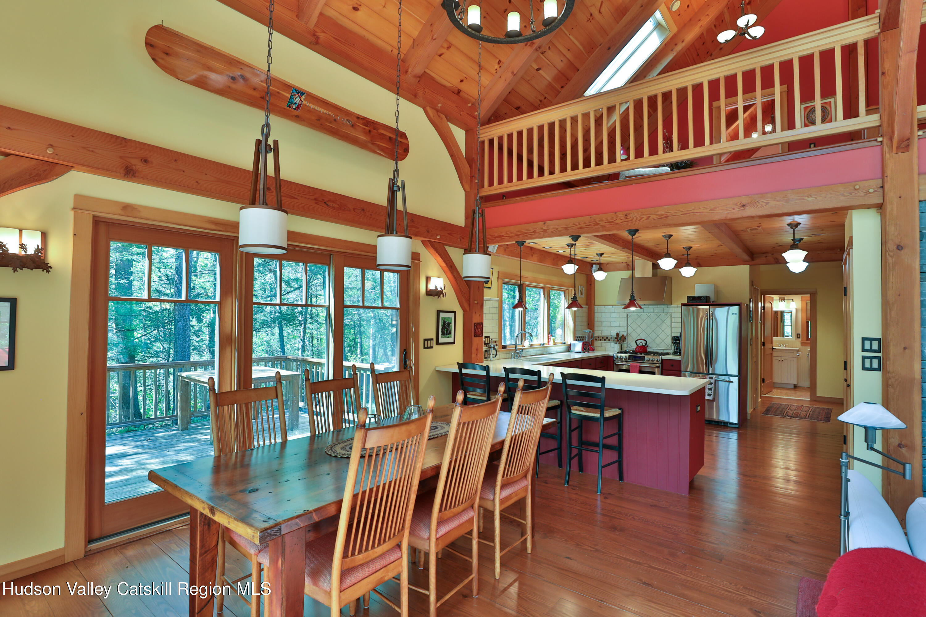 29 Fichtner Road Phoenicia, NY 12464 - Photo 30 of 64 a view of a dining room with furniture wooden floor and chandelier