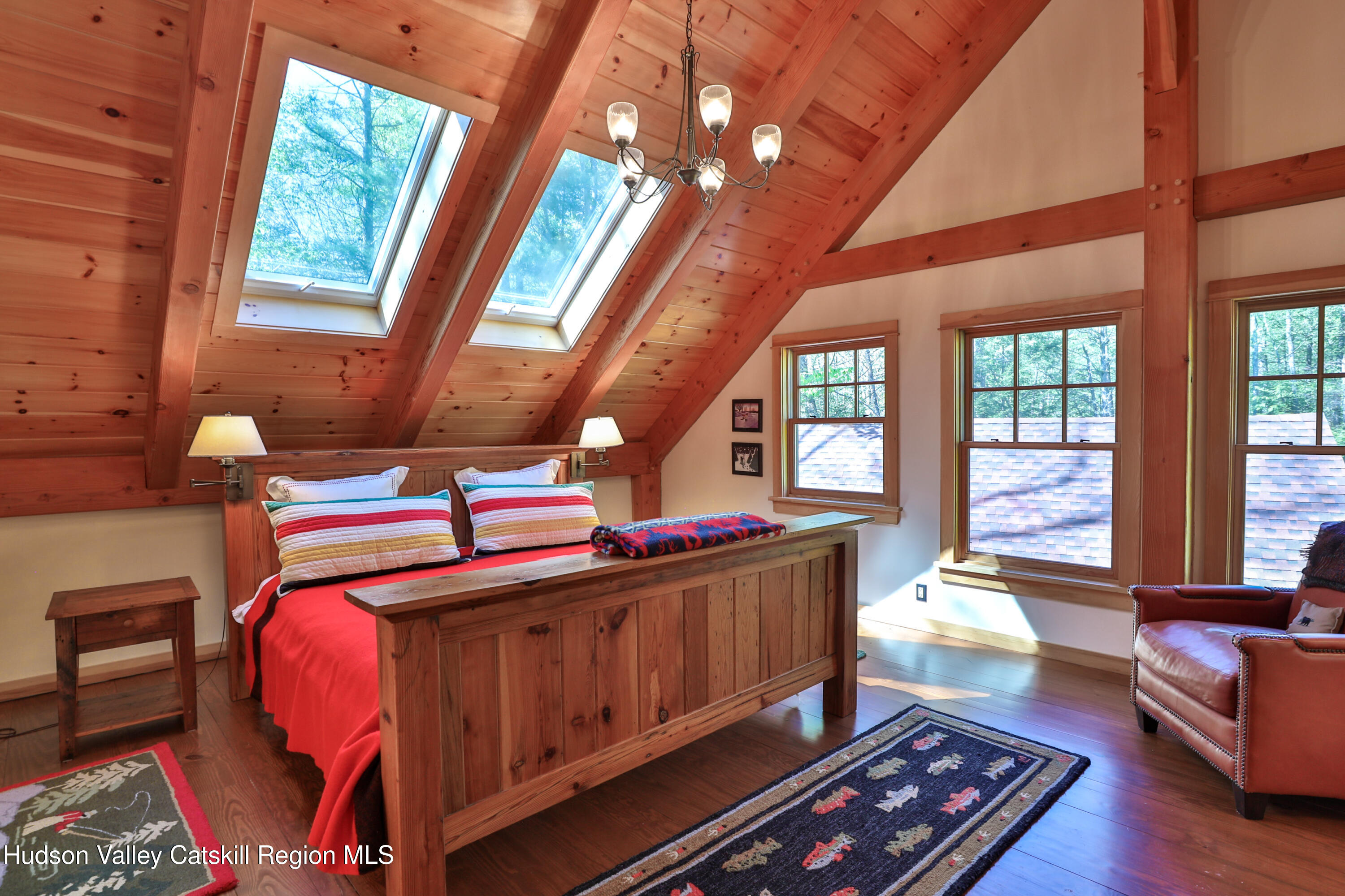 29 Fichtner Road Phoenicia, NY 12464 - Photo 3 of 64 a living room with furniture and a large window