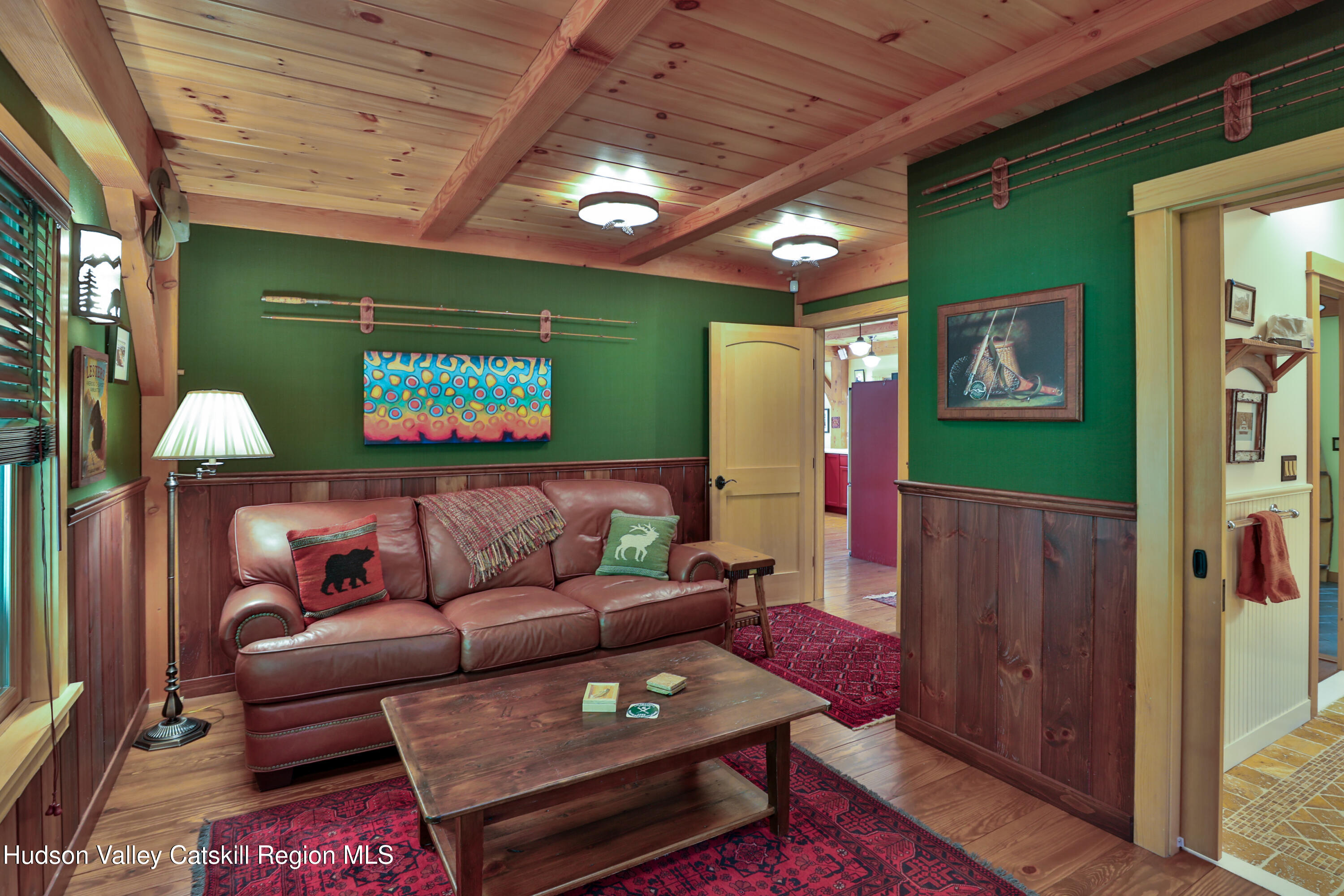 29 Fichtner Road Phoenicia, NY 12464 - Photo 38 of 64 a living room with furniture and a projector