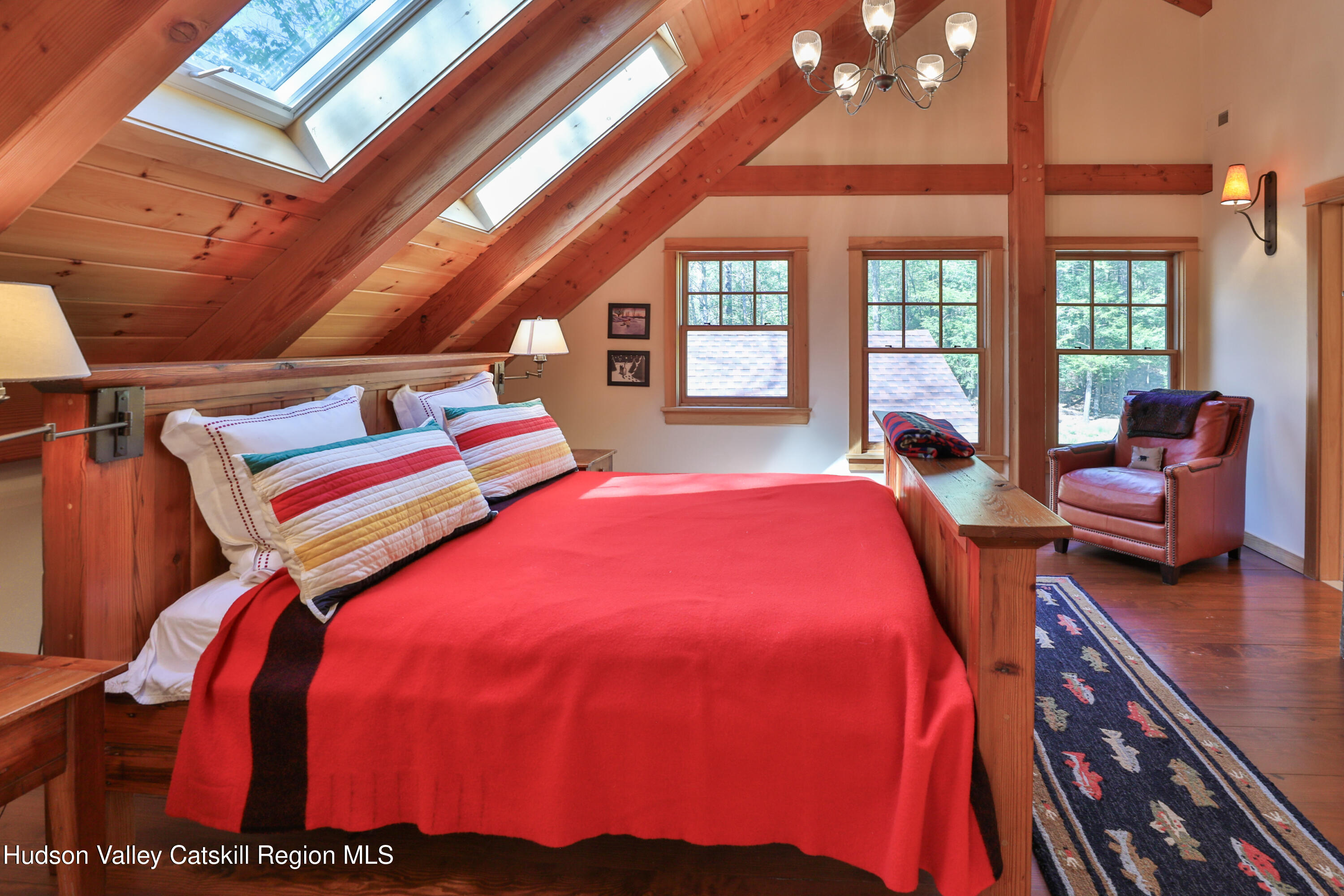 29 Fichtner Road Phoenicia, NY 12464 - Photo 48 of 64 a bed sitting in a bedroom next to a window