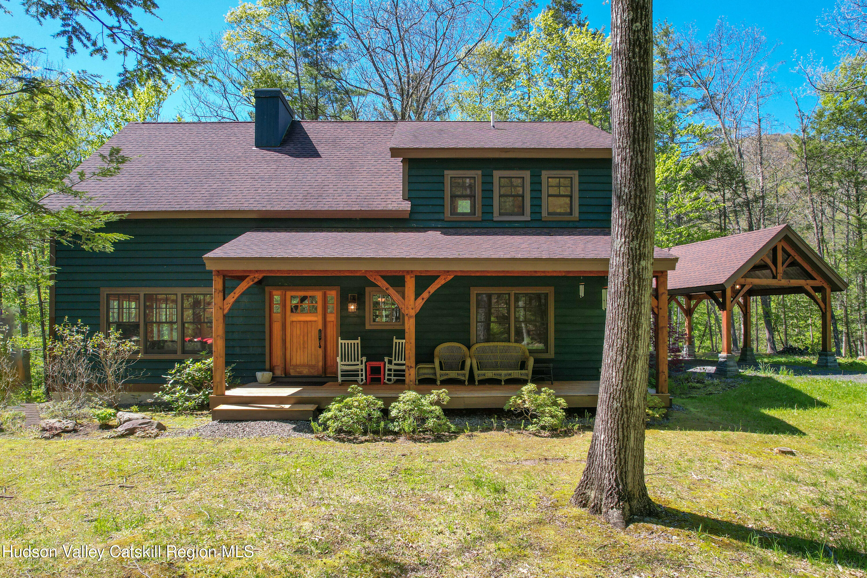 29 Fichtner Road Phoenicia, NY 12464 - Photo 57 of 64 a front view of a house with porch and furniture