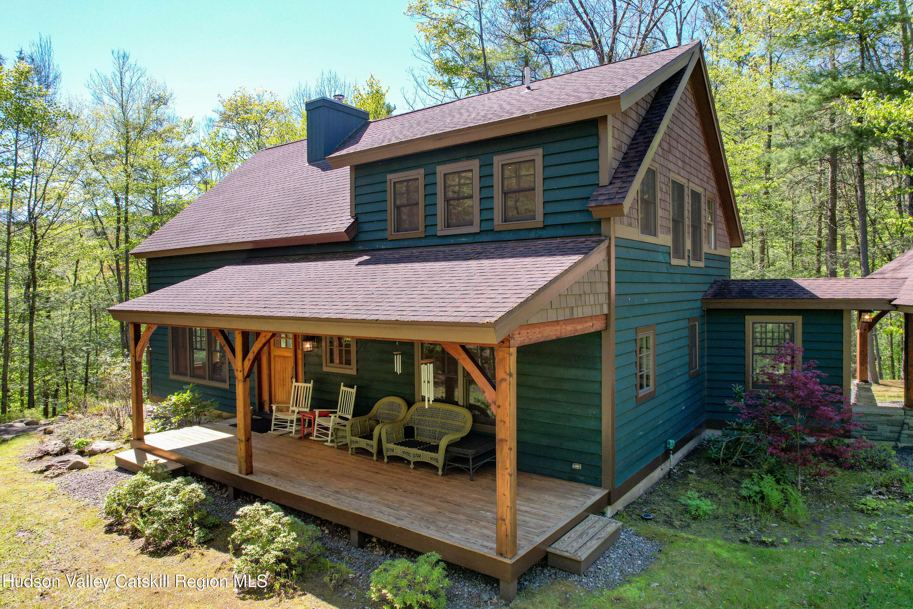 29 Fichtner Road Phoenicia, NY 12464 - Photo 58 of 64 a view of a house with backyard porch and sitting area