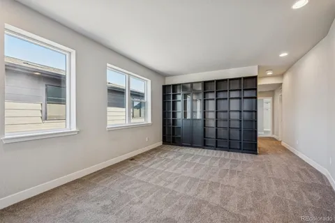 a view of empty room with windows