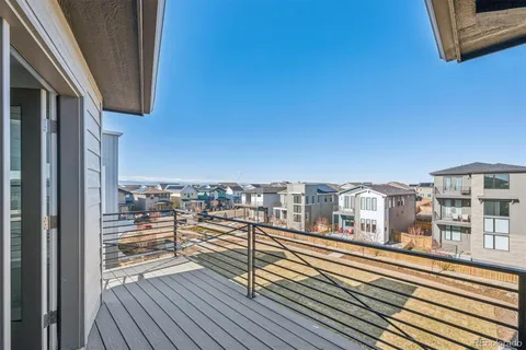 a view of a balcony with city view
