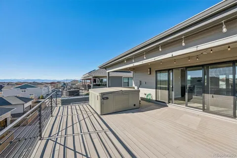 a view of a house with a roof deck