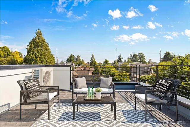 a view of a terrace with furniture