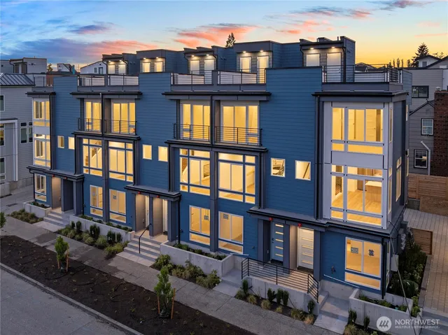 a front view of a building with glass windows