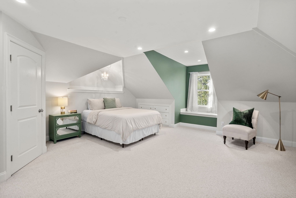 97 Great Plain Avenue Needham, MA 02492 - Photo 28 of 40 a bedroom with a bed and window