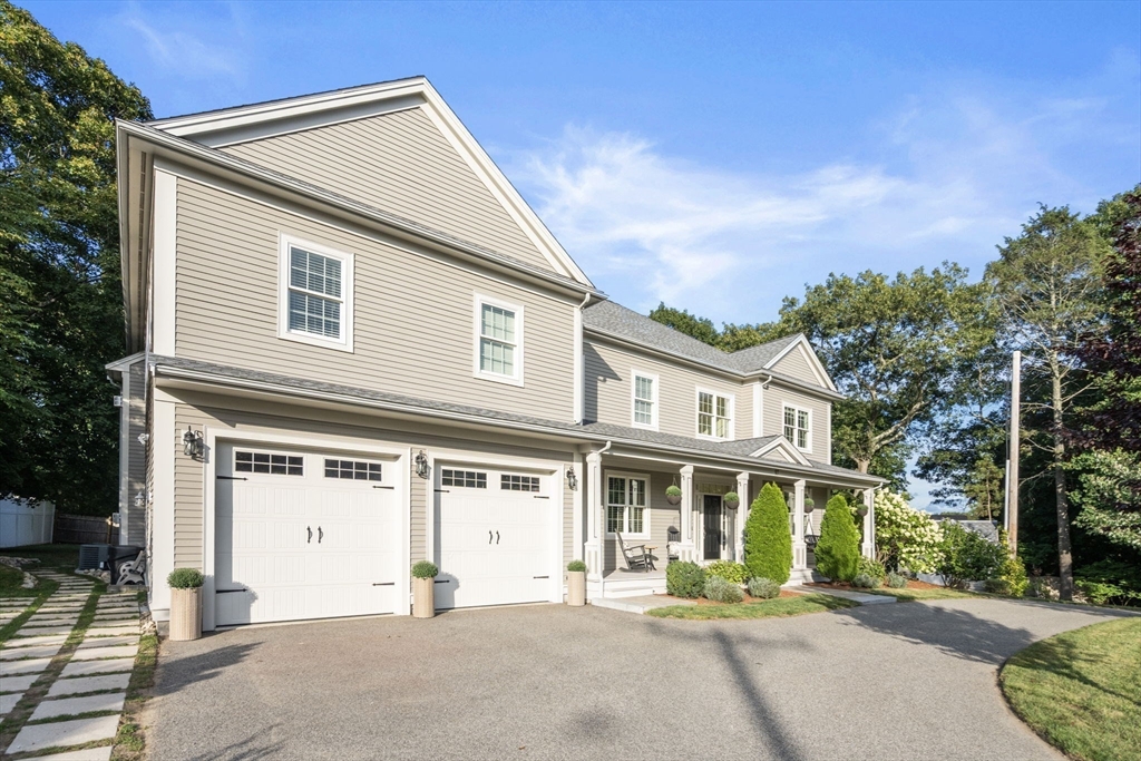 97 Great Plain Avenue Needham, MA 02492 - Photo 36 of 40 a front view of a house with a yard