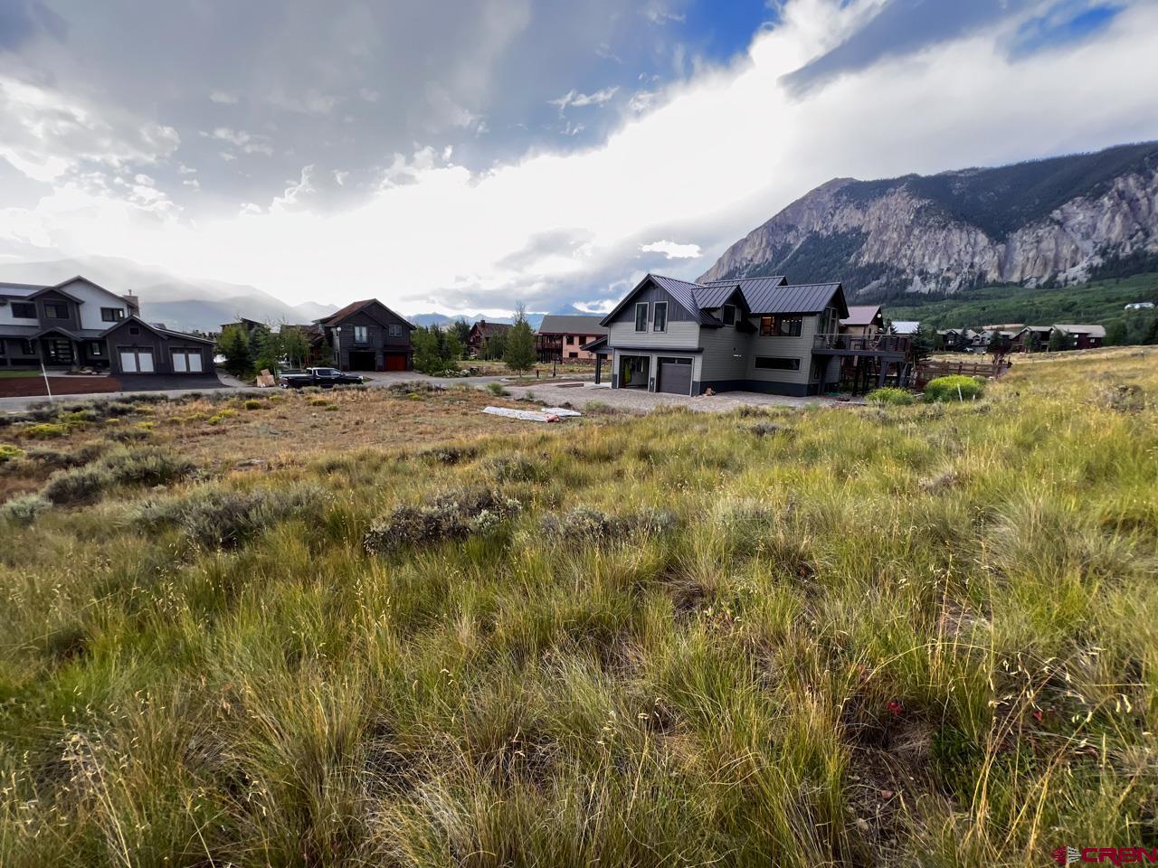 353 Larkspur Loop Crested Butte, CO 81224 - Photo 2 of 6 a view of houses with sky view
