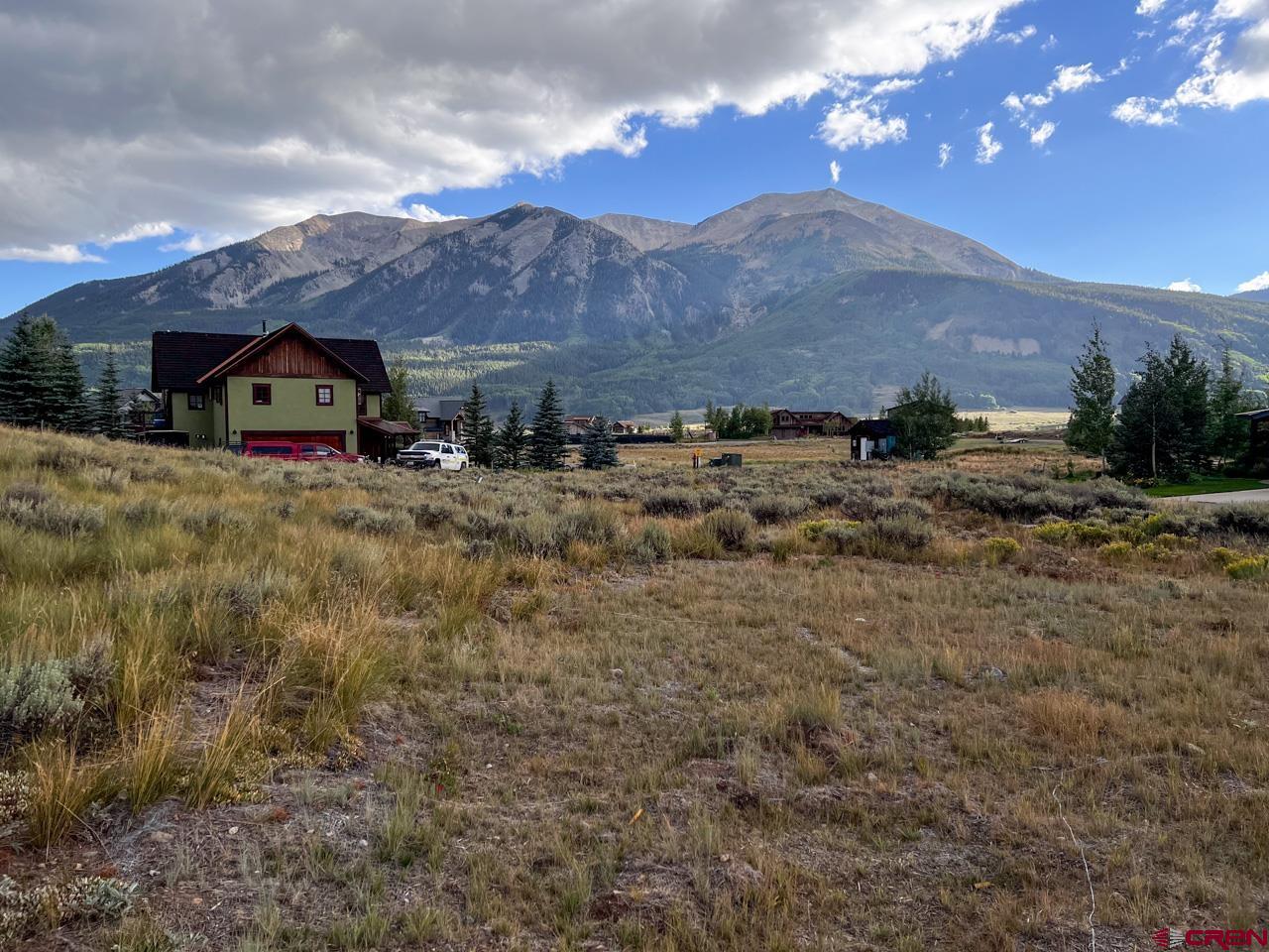 353 Larkspur Loop Crested Butte, CO 81224 - Photo 4 of 6 a view of house with a big yard