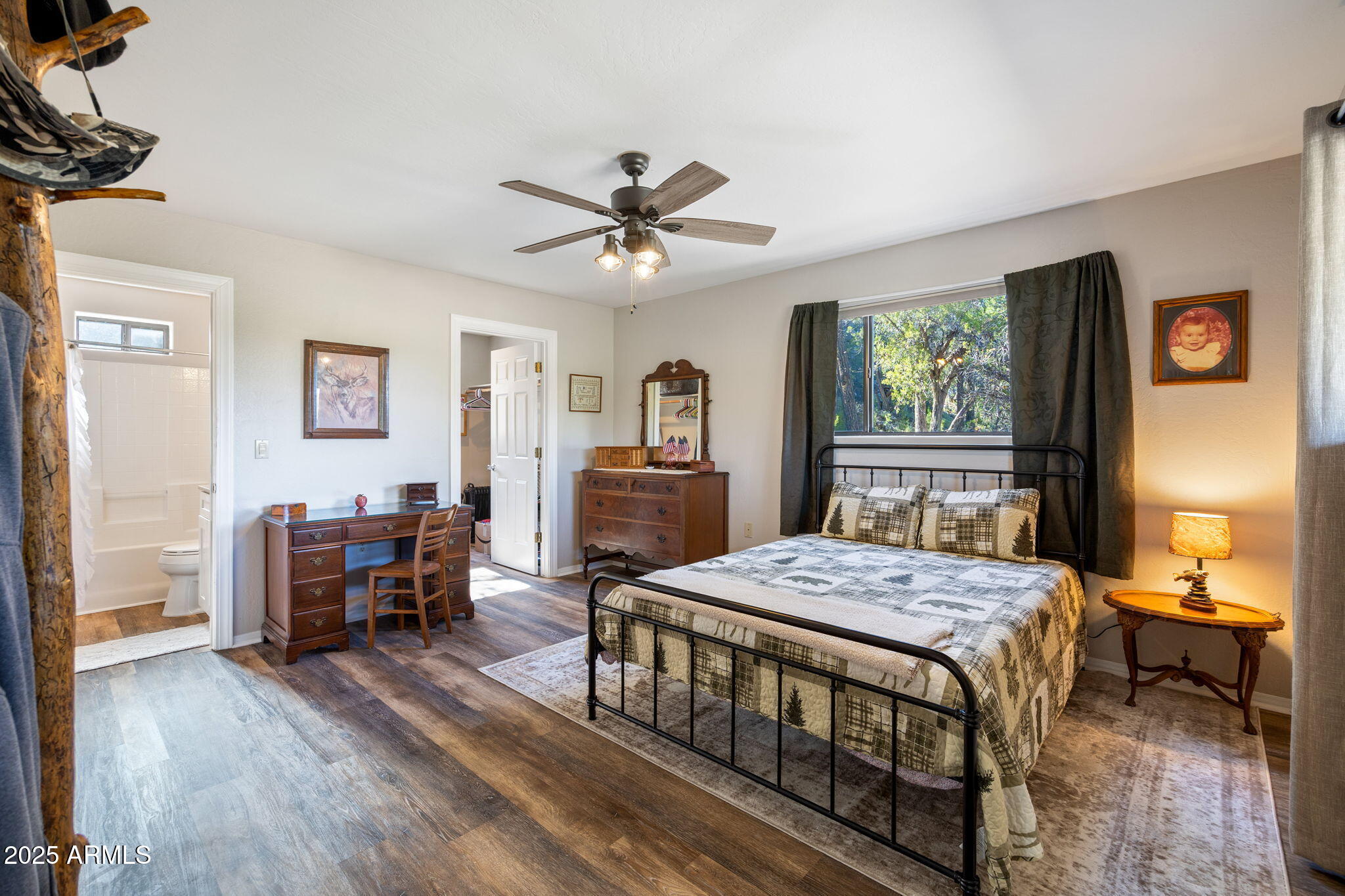 3684 Diamondback Drive Overgaard, AZ 85933 - Photo 11 of 36 a living room with furniture and a wooden floor