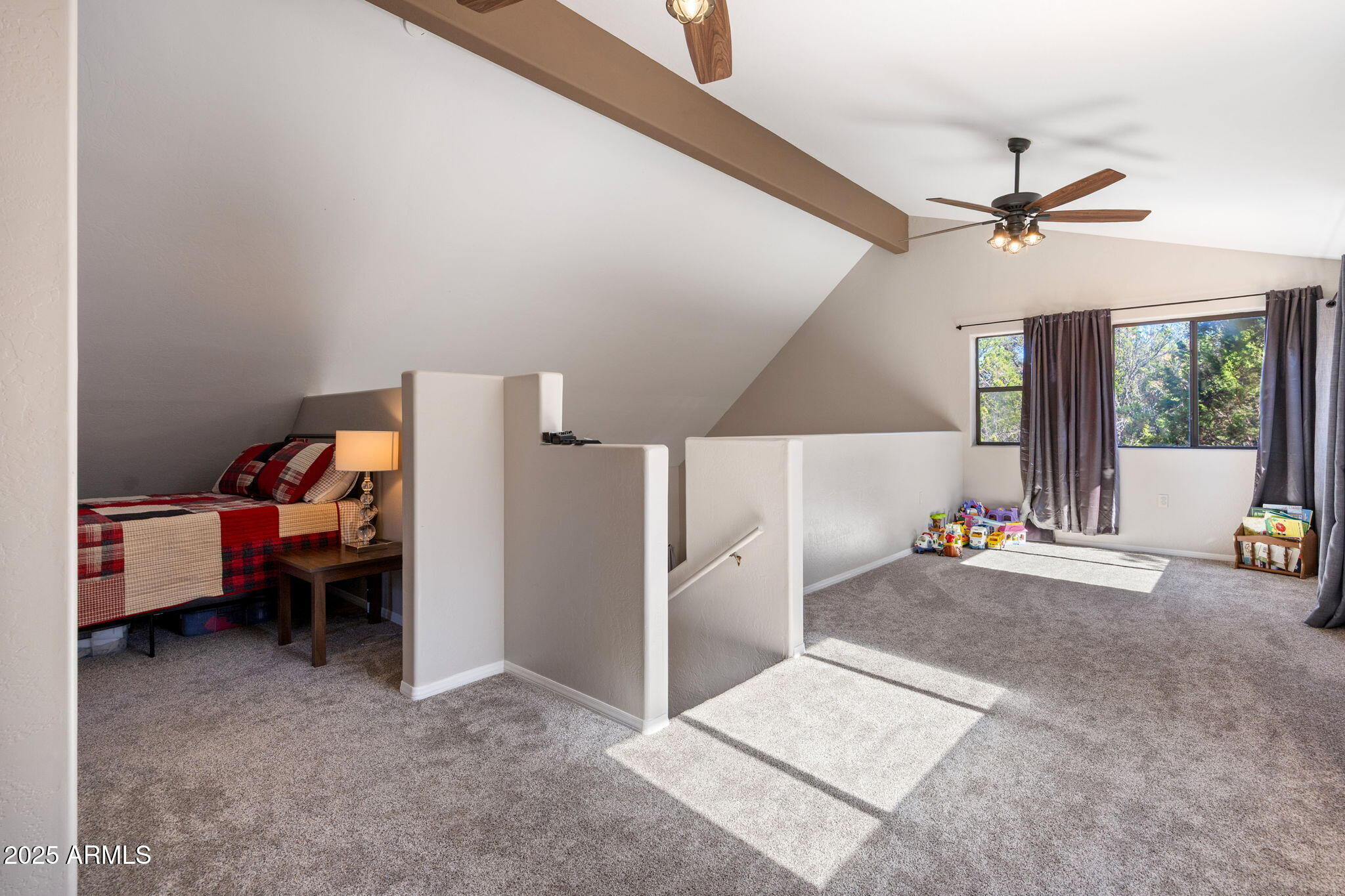 3684 Diamondback Drive Overgaard, AZ 85933 - Photo 15 of 36 a view of a livingroom with furniture and a ceiling fan