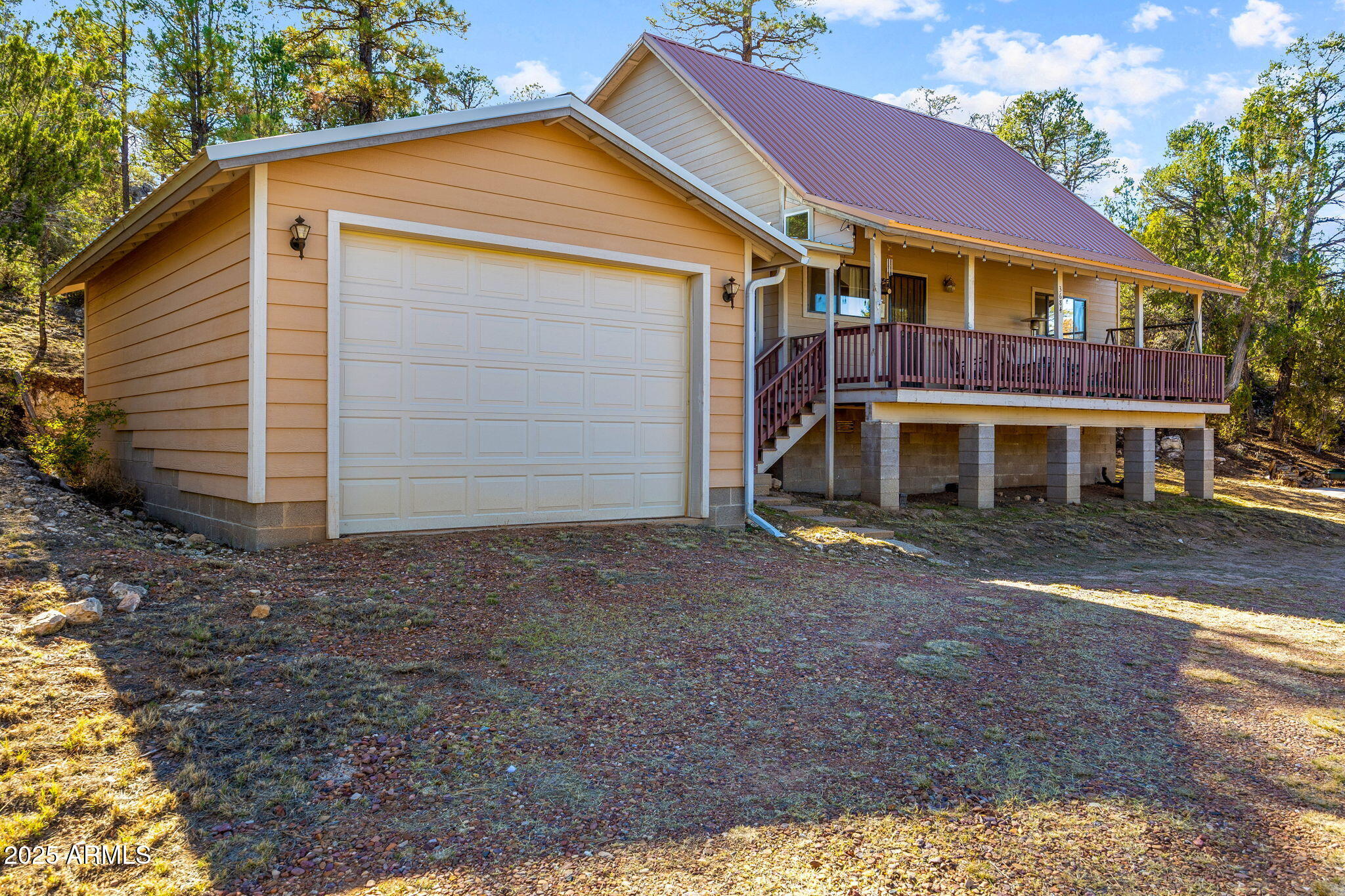 3684 Diamondback Drive Overgaard, AZ 85933 - Photo 30 of 36 a view of a house with a yard