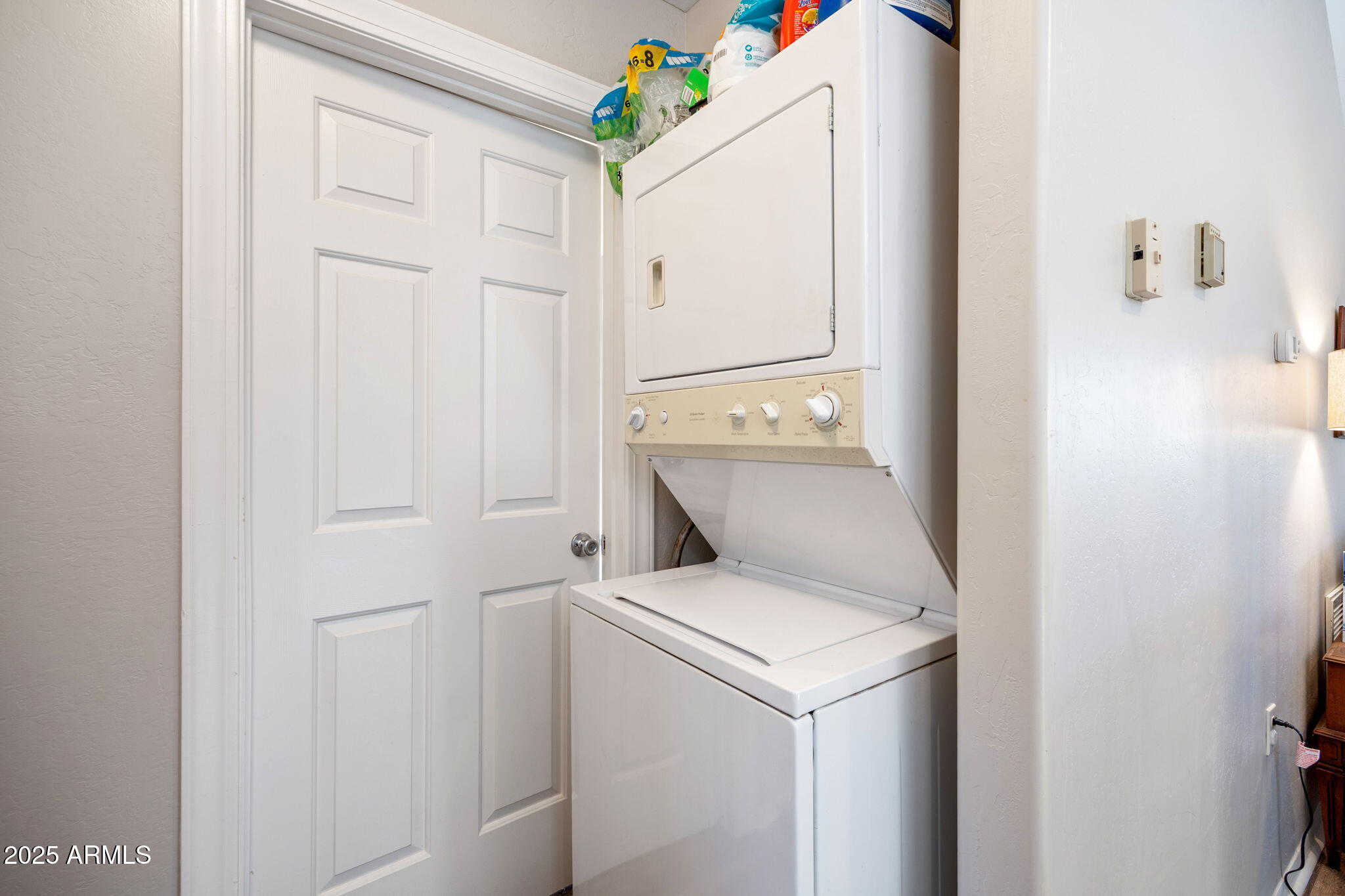 3684 Diamondback Drive Overgaard, AZ 85933 - Photo 9 of 36 a utility room with dryer and washer