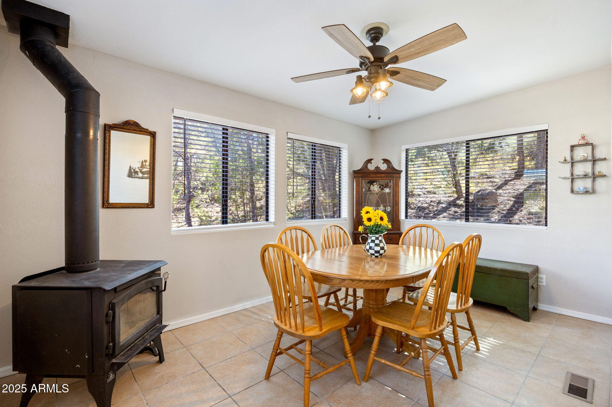 3684 Diamondback Drive Overgaard, AZ 85933 - Photo 10 of 36 a dining room with furniture and window