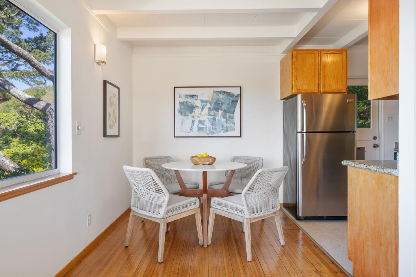 559 Manor Drive Pacifica, CA 94044 - Photo 11 of 38 a view of a dining room with furniture and a window