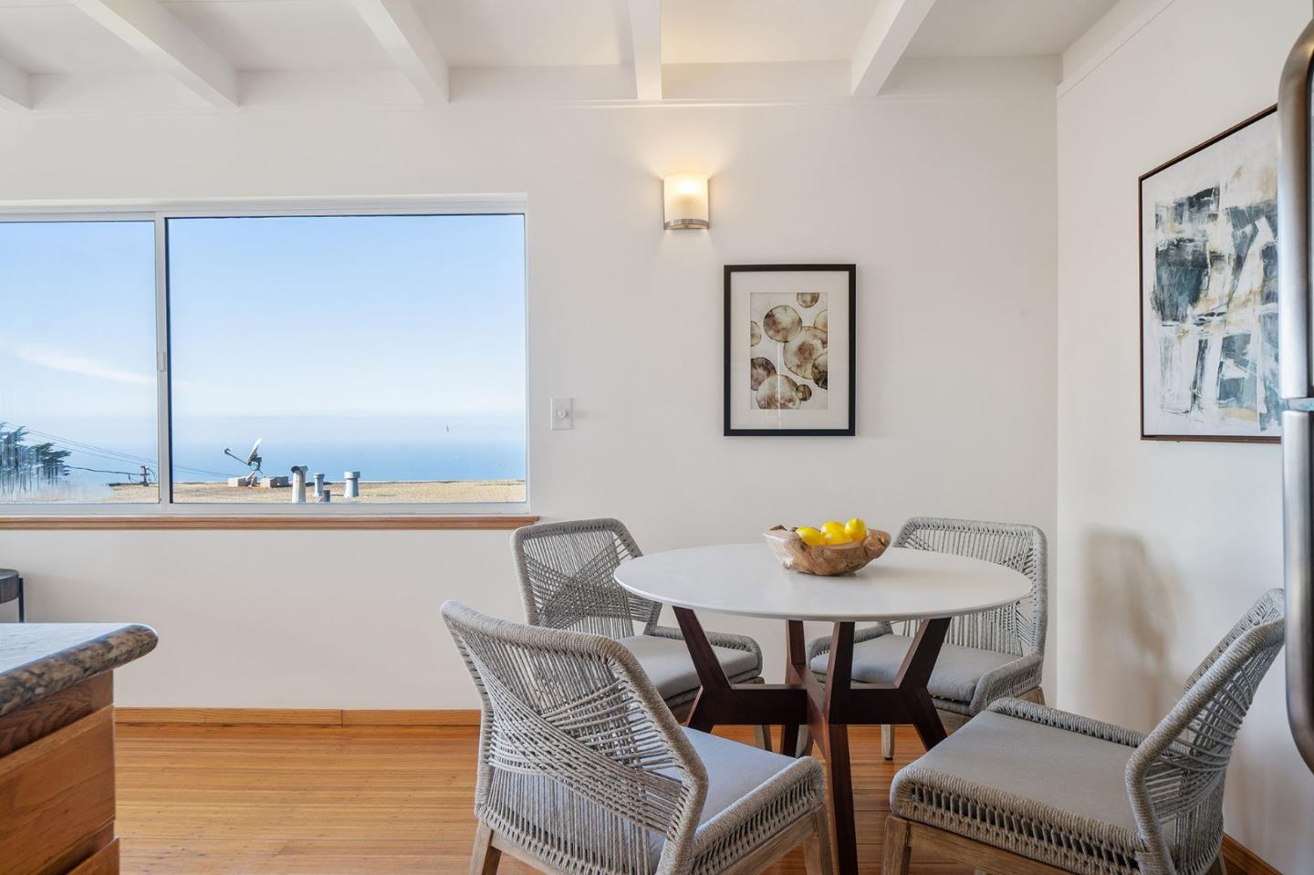 559 Manor Drive Pacifica, CA 94044 - Photo 16 of 38 a view of a dining room with furniture and window