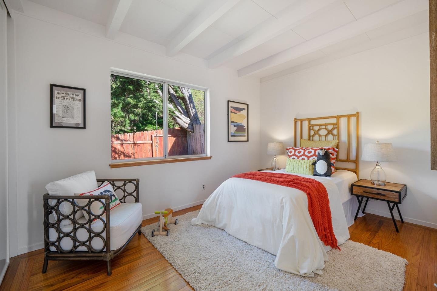 559 Manor Drive Pacifica, CA 94044 - Photo 26 of 38 a bedroom with furniture and a window