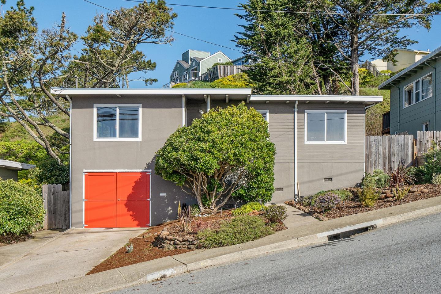559 Manor Drive Pacifica, CA 94044 - Photo 3 of 38 front view of house with potted plants